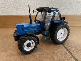 New Holland 110-90