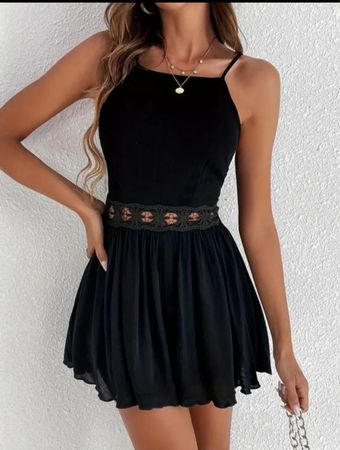 jumpsuit noire avec des détails en dentelle Gr L 