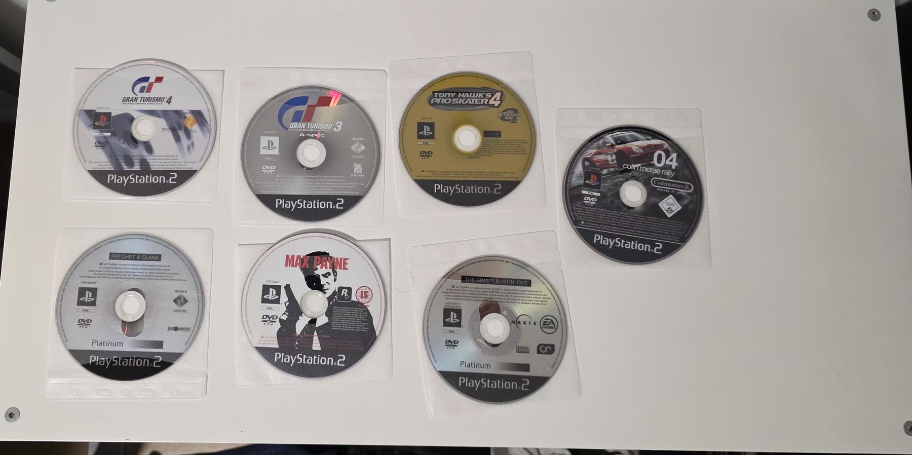 Sony Console: PlayStation 2 Konsole + 2 Controller + 8 Spiele – Usato da Zürich venduto da P-editon 2