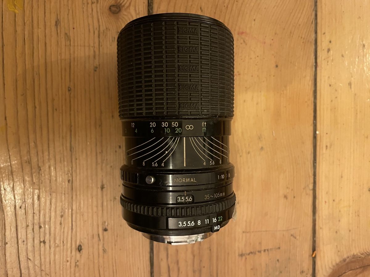 Sigma Obiettivi: Objektiv Sigma 35-105mm – Usato da Zürich venduto da glo_qjx8