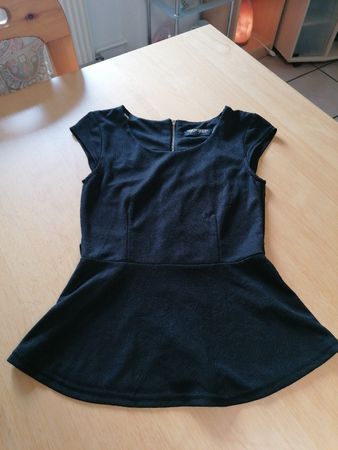 Haut noire, idéale pour la saison. Taille S