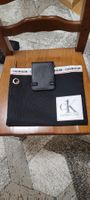  Trouse Calvin Klein et port monnaie Daniel Hechter en cuir