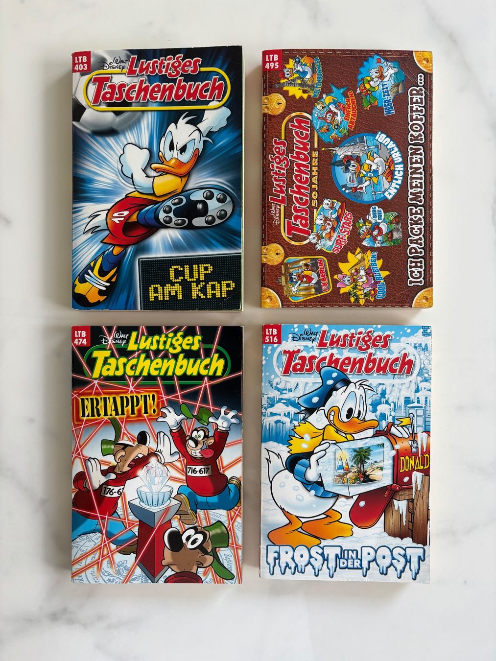 Fumetti: 4 Lustiges Taschenbuch Set – Usato da Lausen venduto da Swissart123