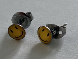 Earrings Smiley face surrounded by silver tone