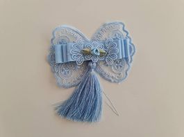 Dekorative Spitzenapplikation blau mit Blume & Quaste 