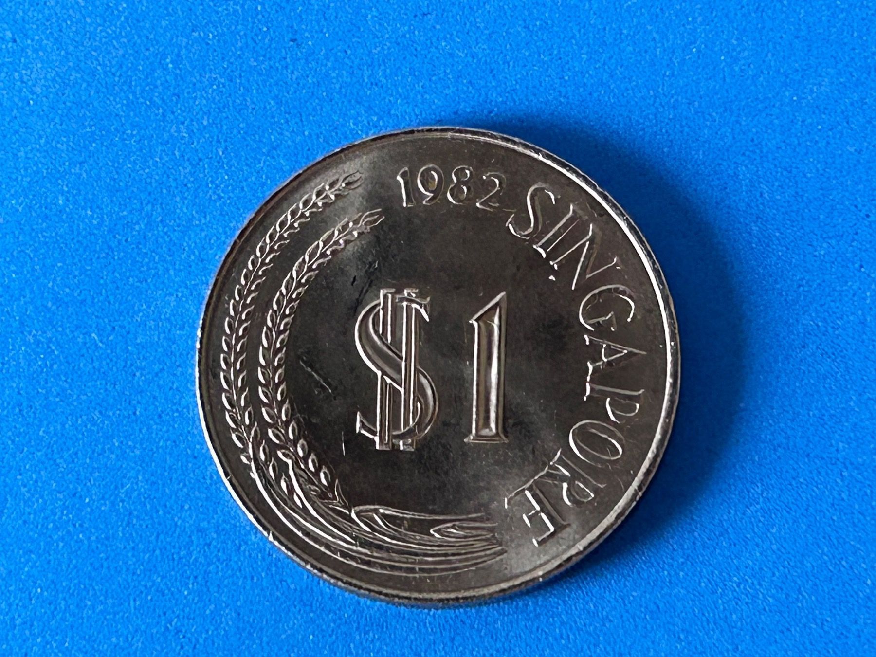 Tutti le monete: Singapore - 1 Dollar 1982 – Usato da Corcelles NE venduto da AJKader 4