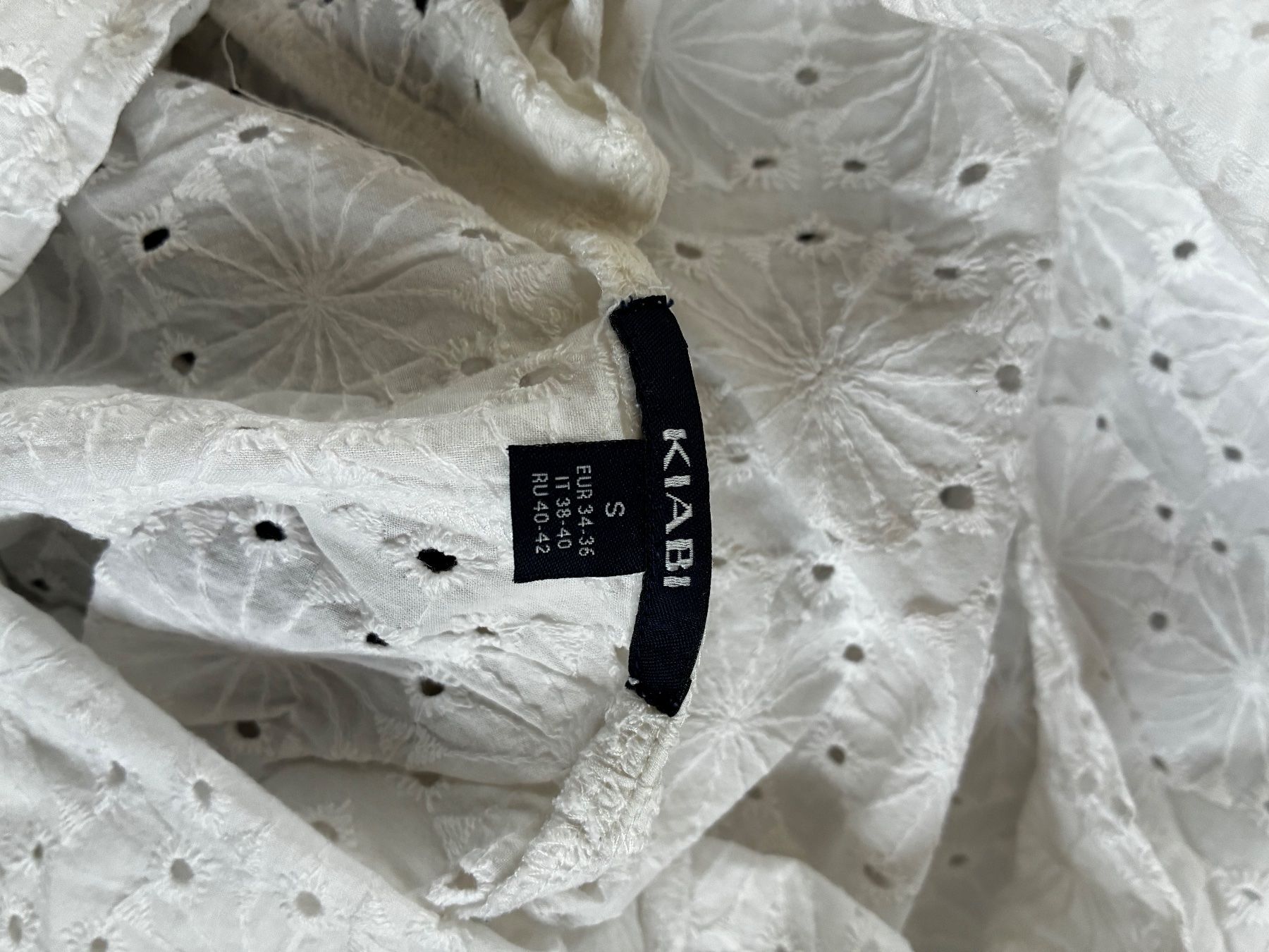 Top: Haut blanc – Usato da Riaz venduto da cam_x5xs 3