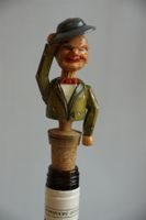 Karkzapfen mit geschnitzter Figur