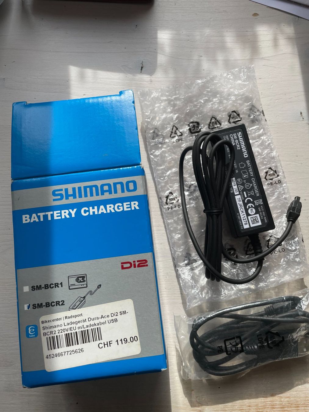 Shimano Pezzi di ricambio: Shimano Ladegerät, inkl. USB-Kabel – Nuovo e nell'imballaggio originale da Oberhofen Thun'see venduto da bluefootedboby 1