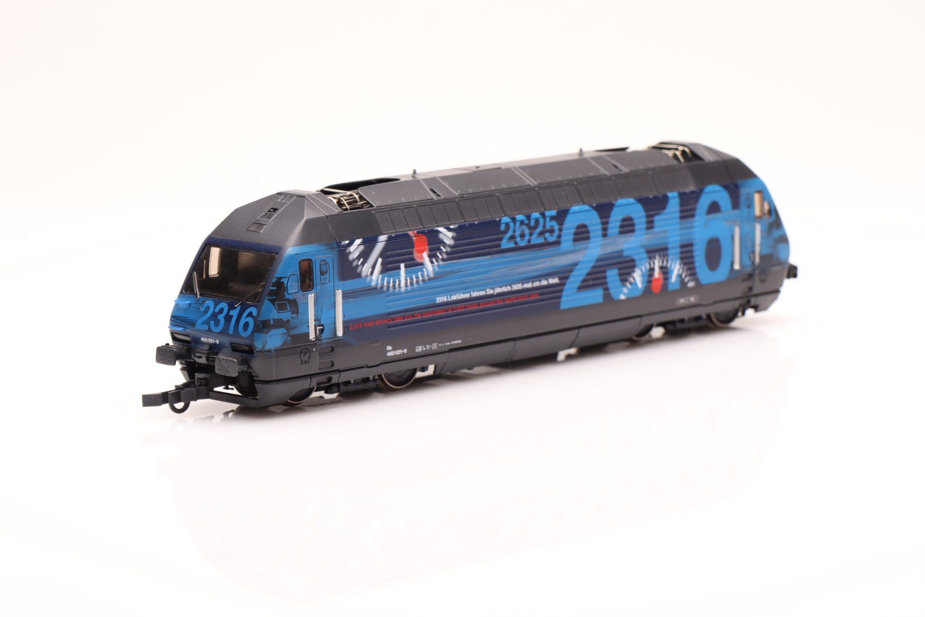 Roco Modelleisenbahnen: Roco SBB Re 460 "Mondaine" DC Digital, H0 – Gebraucht aus Ried (Muotathal) von Modellbahn.swiss 3