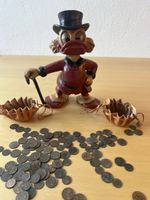 Figur Dagobert Duck mit 2 Ledertaschen und Munzsammlung