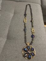 Grand collier sautoir élégant avec pendentif fleur