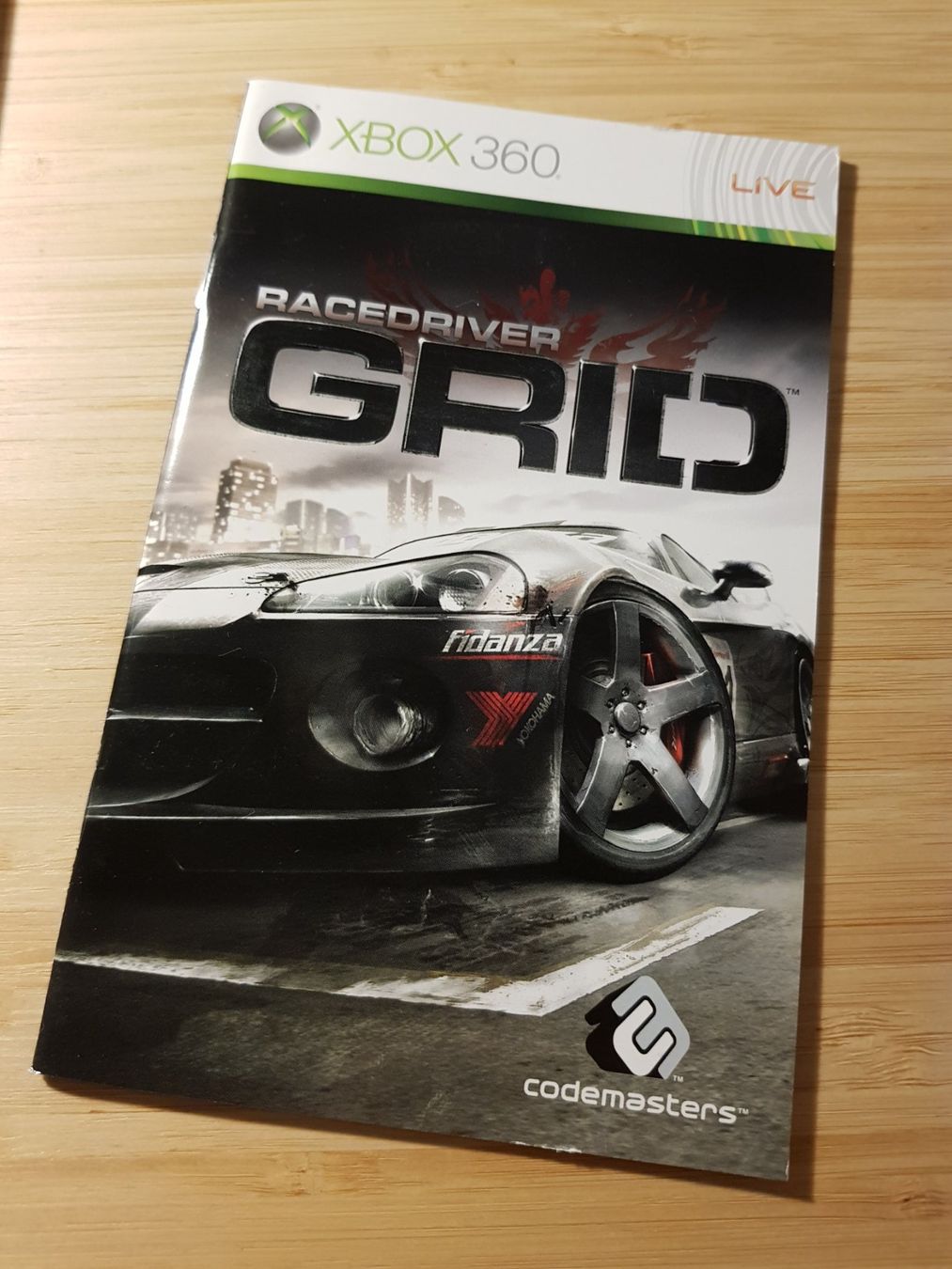Microsoft Spiele: Spielanleitung Racedriver Grid Xbox 360 – Gebraucht aus Münchenstein von 2DGames