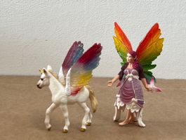 Schleich Bayala Elfe Lis mit Regenbogen Einhorn