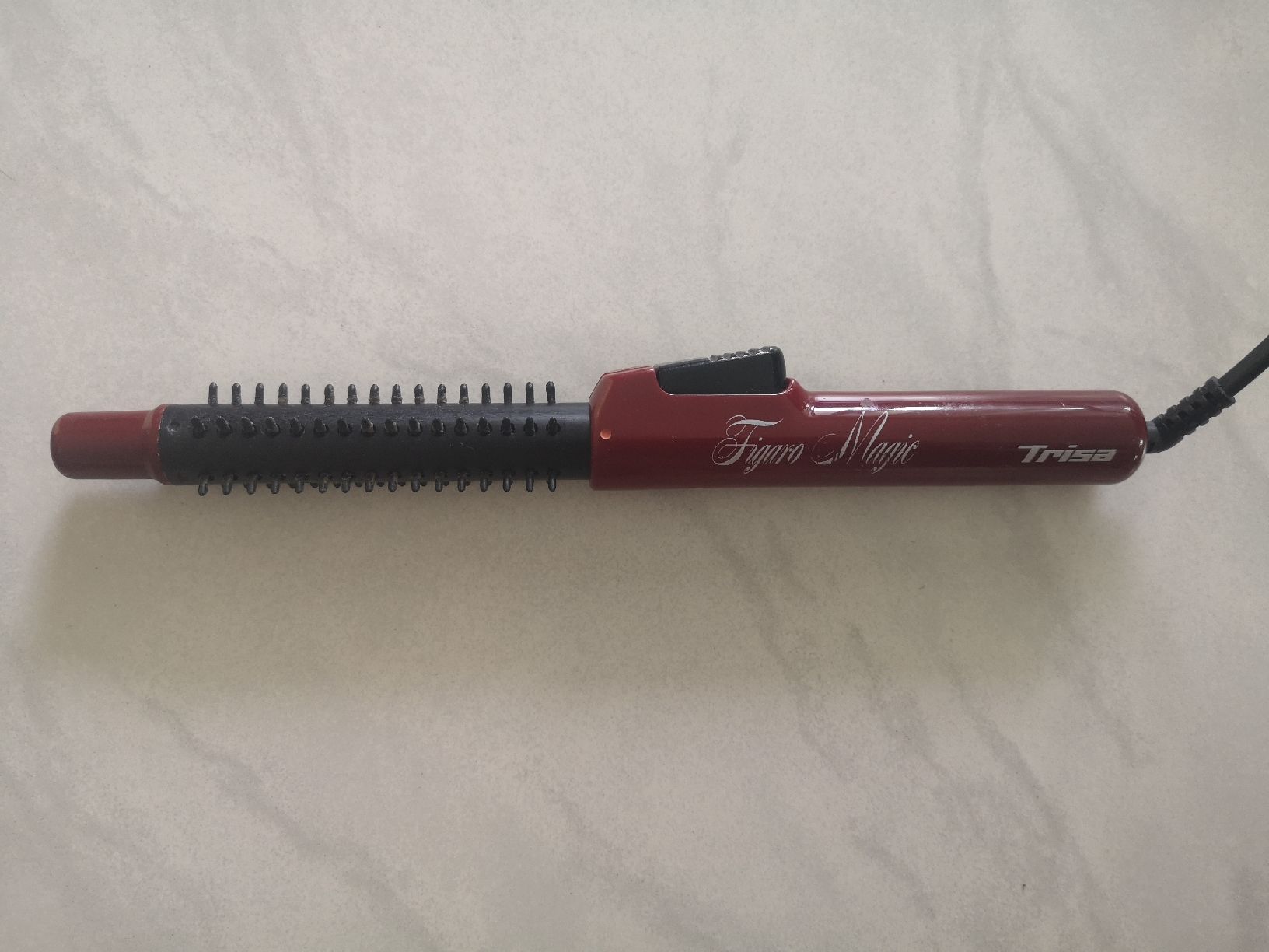 Trisa Fers à boucler & lisser: Lockenstab Trisa – D'occasion à Sissach par cor_n2dt