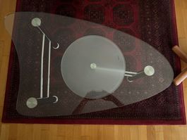Glastischchen mit beweglicher Ablagefläche