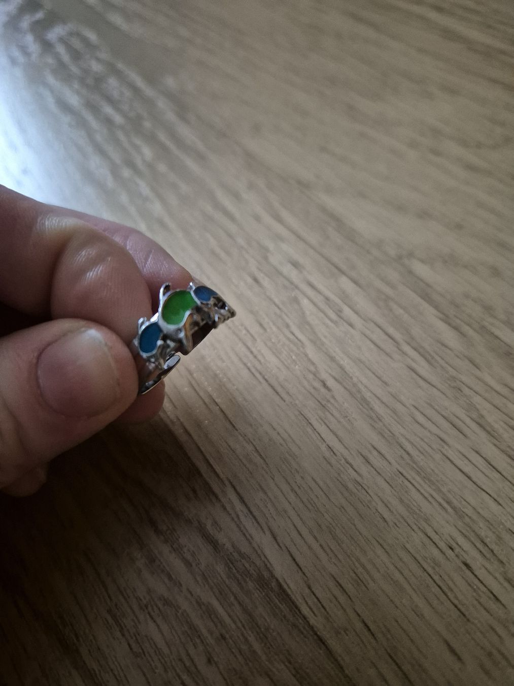 Anelli: Silberner Ring mit farbigen Delfinen – Usato da Langenthal venduto da Polarisstern 1