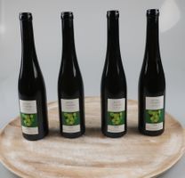 Vier Flaschen Jeninser Completer Jahrgang 1998
