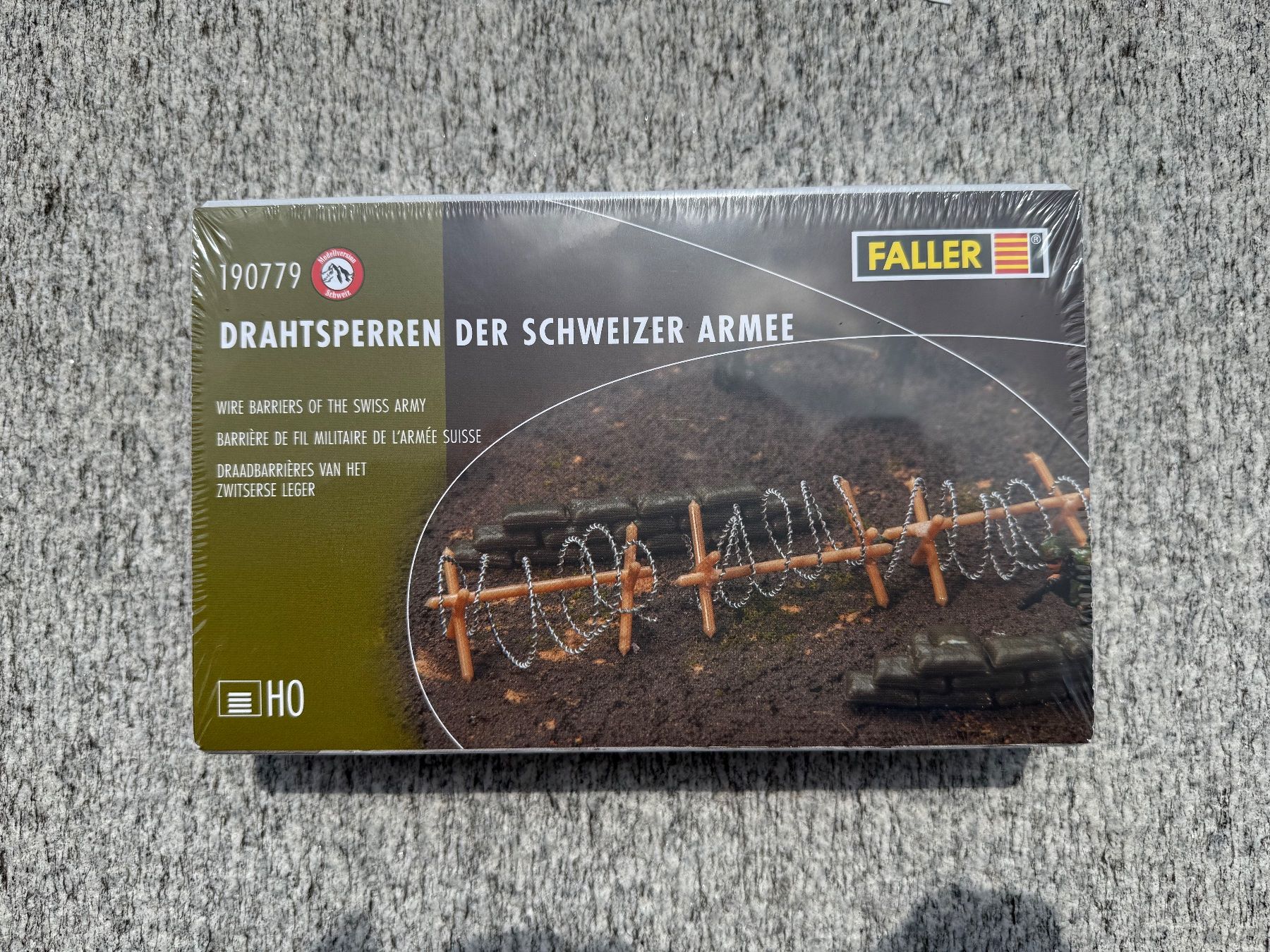 Faller Modellini di ferrovie: Faller H0 190779 Schweizer Armee Drahtsperren SWISS – Nuovo e nell'imballaggio originale da Chiasso venduto da Carrara-Modellismo