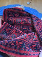 Union Teppich Begum aus reiner Wolle rot gemustert