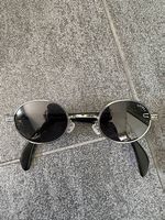 Sting Sonnenbrille mit runden Gläser