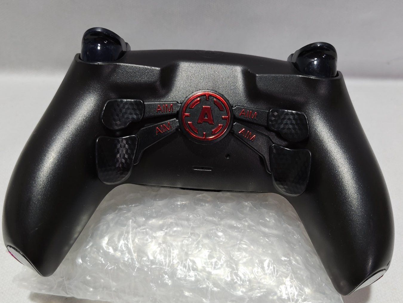 Sony Console: Manette PS5 pro, DualSense Customisée Rose et Noire. – Usato da Courtemaîche venduto da Atelier.tech 3
