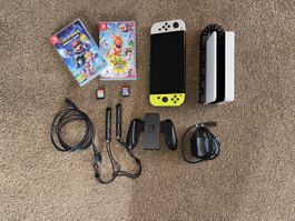 Nintendo Switch OLED mit Ladestation, 2 Spielen und Zubehör