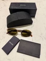 PRADA sunglasses, golden frame, with case and papers😎.