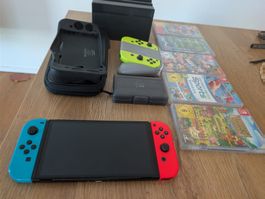 Nintendo Switch Konsole mit Zubehör und 4 Spielen