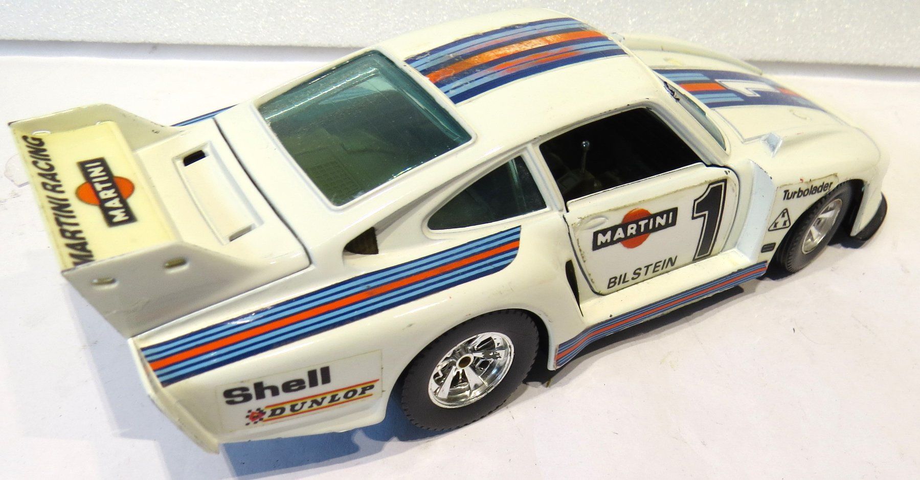 Porsche Modellini d'auto: 1:24 Porsche 935 Martini Racing – Difettoso da Ettingen venduto da Burago 1