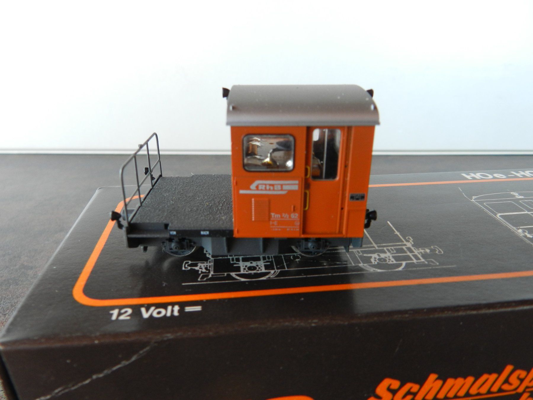 Bemo Trains électriques: H0m BEMO Rangiertraktor Tm 2/2 RhB braun – Neuf (Voir description) à Arzier-Le Muids par elocin83 3