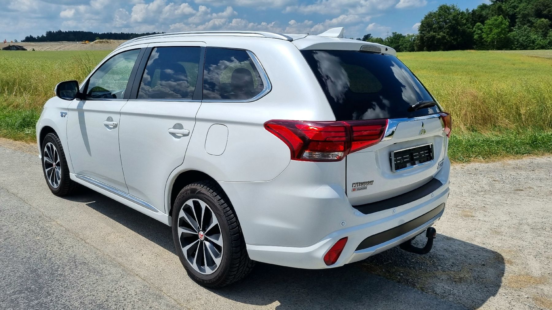 Mitsubishi Automobili: Mitsubishi Outlander 2.0 PHEV 4x4 / 2015 – Usato da Emmen venduto da Highlife_Technik 3