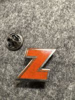 Pin Radio Z orange silberfarben