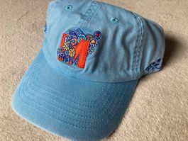 Casquette Fleurs Migros x Fichtre 80 ans bleue