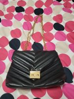 Handtasche