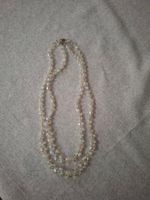 collier vintage à perles transparentes