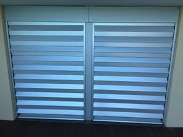 2 elektrische Sicherheitsfaltstoren / Rollladen Stobag