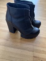 Stiefel mit Absatz