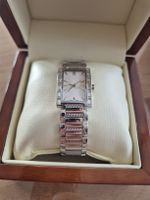 Damen Armbanduhr rechteckig silberfarben neu