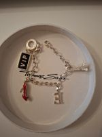 Thomas Sabo Charm Armband mit vier Anhaengern Silber