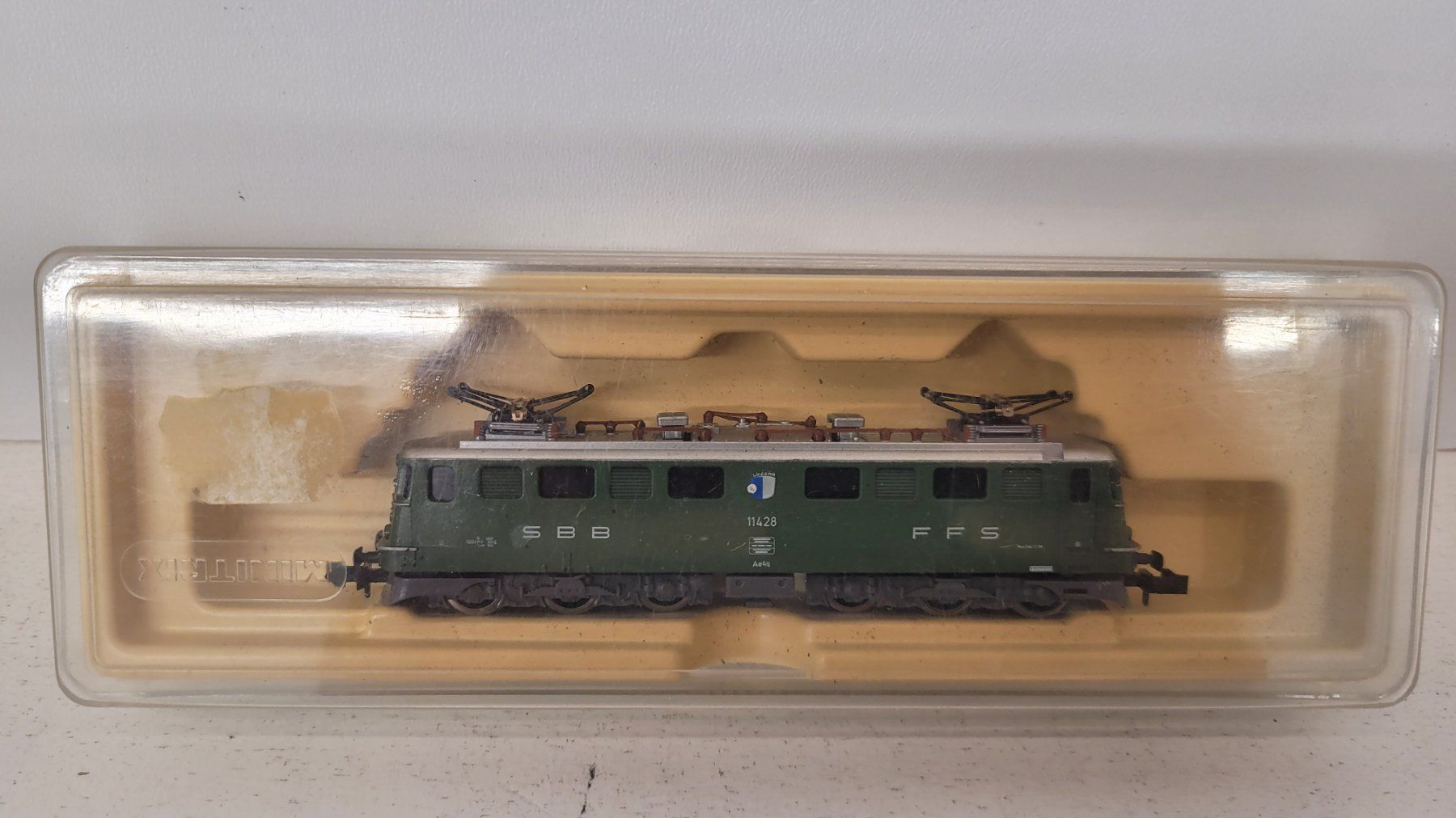 Trix Modellini di ferrovie: Spur N Minitrix 12891 SBB Ae 6/6 GEPRÜFT – Usato da Büsserach venduto da ModellbahnDepot