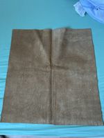 Lederrest hellbraun ca. 62. 57(I20)