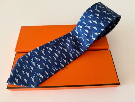 Cravate HERMES-Paris „Blue Planes“ + petit box orange
