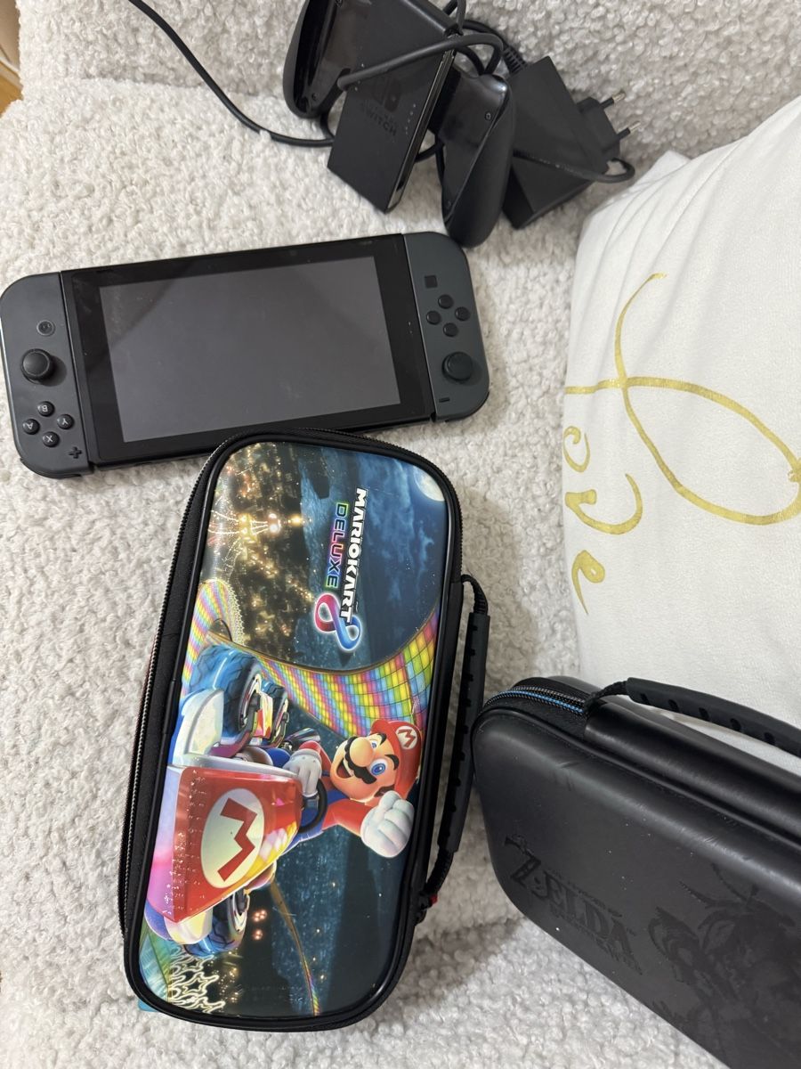 Nintendo Console: Nintendo Switch grise avec 15 jeux et accessoires – Usato da Brügg BE venduto da haj_9zhk 2