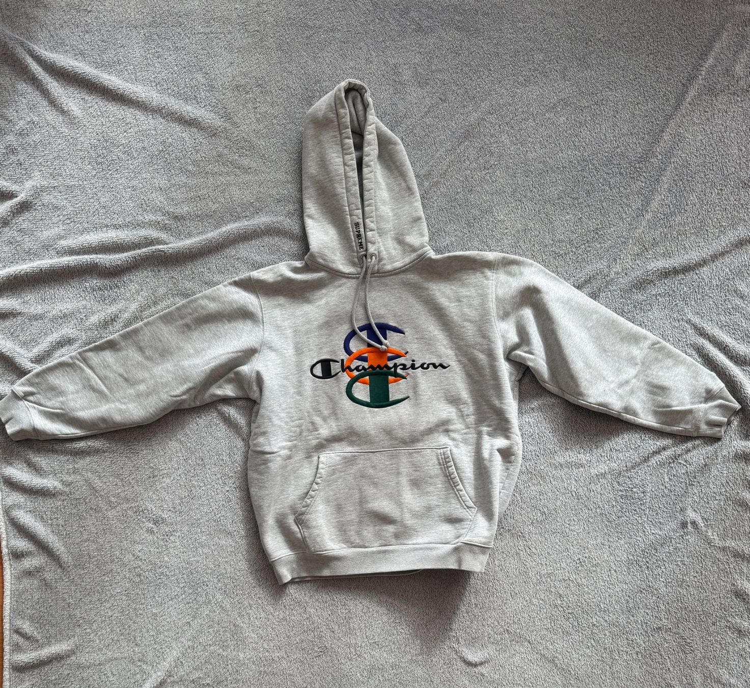 Balenciaga Maglioni & Felpe: Supreme x Champion Hoodie grau – Usato da Winterthur venduto da lolmarco