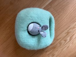 Lovevery Bunnies in a felt burrow