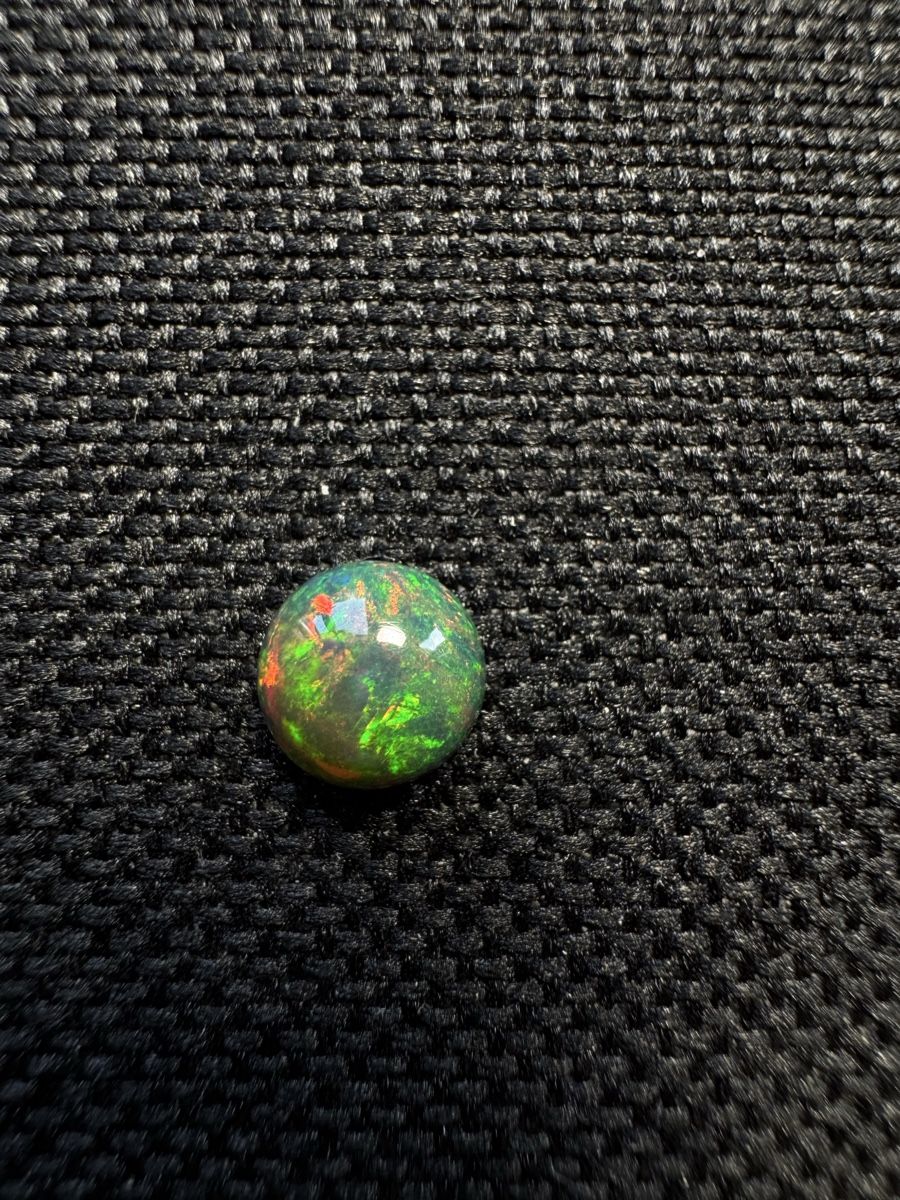 Pierres précieuses: Black Opal 0.65ct – Neuf avec emballage d'origine à Wängi par Horus90