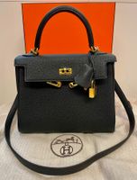 HERMÈS Kelly 25 Schwarz/Gold * NEU 2026 *