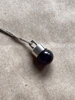 Schöner Anhänger mit Onyxstein ( 1 cm )
