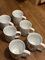 4er Set Keramiktassen + 2 mit Blumenmuster